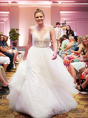 Model walking in a bridal gown